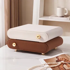 Stackable double layer jewelry storage box with drawers, elegant white and brown leather design.