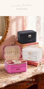 Detail view of multi-layer PU leather jewelry box with necklace hooks and ring slots.