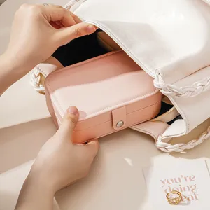 Travel PU leather jewelry box organizer for rings necklaces and earrings, portable pink.
