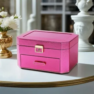 Pink PU leather double layer jewelry box with lock, elegant organizer for rings and necklaces.