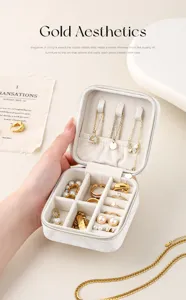 Portable jewelry box organizer with multi-compartments, travel storage for rings and necklaces.