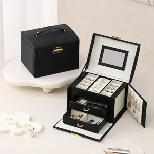 Black leather jewelry box with mirror, lock, and multi-layer drawers for rings and necklaces.