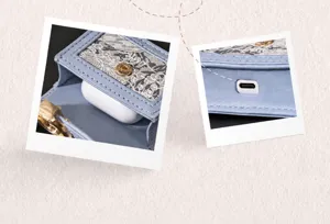 Detailed view of vintage jacquard portable earphone case, leather and fabric protective pouch.