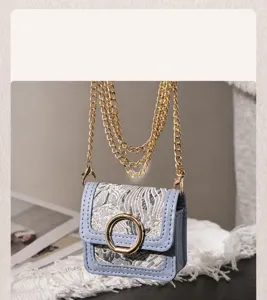 Mini vintage jacquard earphone bag with gold chain strap and metal ring clasp for travel.