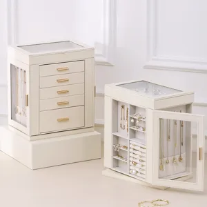 Grande boîte à bijoux en cuir avec tiroirs multicouches, fenêtre en verre et colliers.