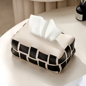 Luxury leather tissue box with black and beige woven checkerboard design for home decor.