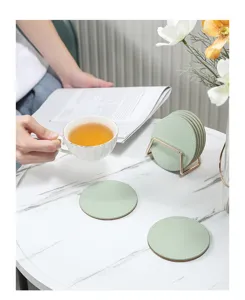 Round leather cork coasters set with metal holder, heat-resistant table mats for cups.
