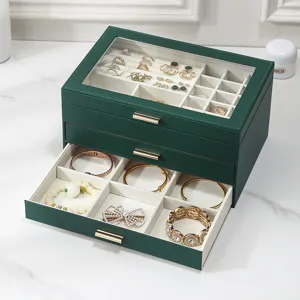 Dark green multi-layer jewelry box with clear window, velvet lining for rings, earrings and bracelets.