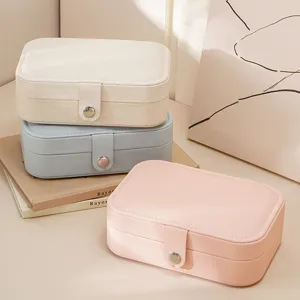 Portable small jewelry box with snap closure, perfect for storing rings, earrings and necklaces.