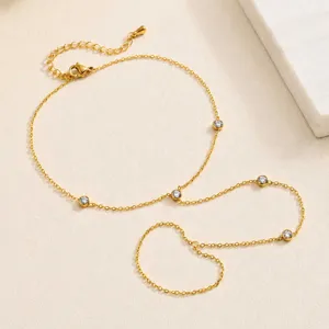 Exquisite detail view of gold stainless steel zircon toe anklet, perfect for beach vacation.