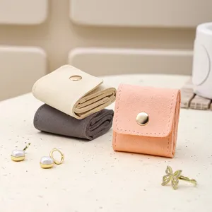 Portable mini velvet jewelry travel organizer bag for rings, earrings and small accessories.