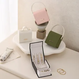 Portable Travel Jewelry Box Mini PU Leather Jewelry Organizer Case With Handle For Rings Earrings Necklace Storage Jewelry Box