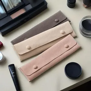 Solid color portable suede jewelry pouch travel storage bag for necklaces rings and earrings