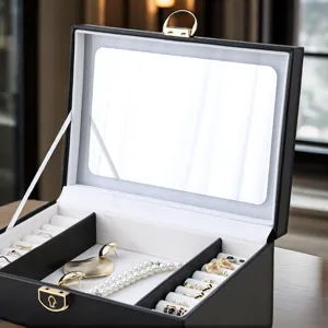 Black leather jewelry box with mirror and large capacity storage for rings, necklaces, and earrings.