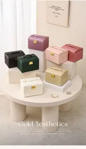 Portable multi-layer large capacity PU leather jewelry box with lock and handle for rings earrings.