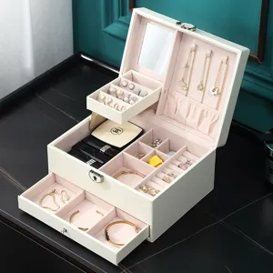 Mehrschichtige abschließbare Schmuckschatulle mit Spiegel, elegante PU-Leder Aufbewahrung.
