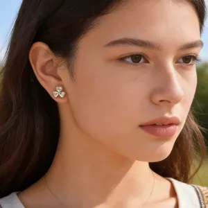 Detail view of exquisite gold heart-shaped zircon stud earrings worn by model, elegant design.