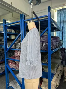 Blue and white striped V-neck short sleeve blouse with ruffle cuffs, casual everyday wear.