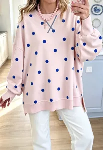 Pink polka dot sweatshirt for women, casual loose long sleeve crewneck pullover with side slits.
