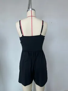 Women summer black backless spaghetti strap romper detail shot, casual sexy cute shorts.