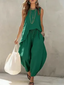 Detailed shot of the green linen sleeveless top and harem pants set, comfortable casual wear.