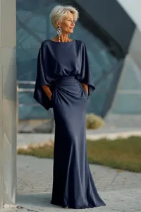 Elegant dark blue boat neck evening gown with high waist and pleated mermaid long dress.