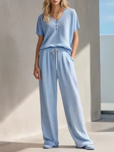 Waffle knit lounge set detail featuring a short sleeve V-neck top and matching wide leg pants.
