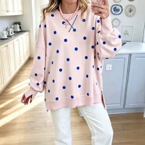Women pink polka dot sweatshirt casual loose long sleeve crewneck pullover with side slits.