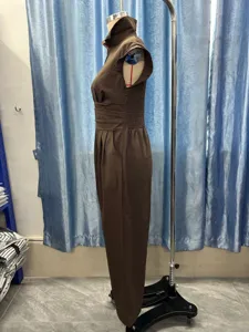 Women's linen lapel sleeveless jumpsuit with high waist and wide legs for casual resort wear.