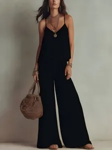 Detailed view of women's black spaghetti strap top and wide-leg pants two-piece set.