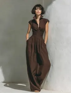 Detail view of the stylish brown linen sleeveless jumpsuit featuring a chic lapel and wide leg.