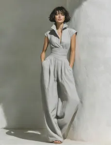 Close-up detail of the elegant linen sleeveless lapel wide-leg jumpsuit, resort style.