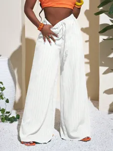 White textured high waist wide leg pants with drawstring, loose casual beach drape trousers.