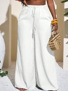 High-waisted textured wide-leg pants with drawstring, casual beach loose long trousers.