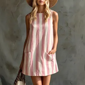 Close-up detail view of the pink and white striped sleeveless mini dress with side pockets.