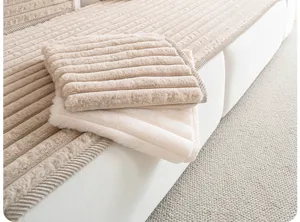 Detailed shot of winter warm plush striped sofa mat, soft rabbit fur texture, cozy home decor.