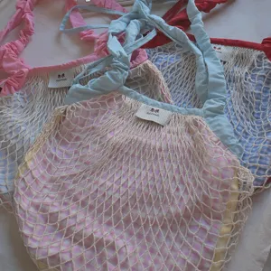 Spring new dopamine mesh shoulder bag with gingham lining, casual drawstring tote design.