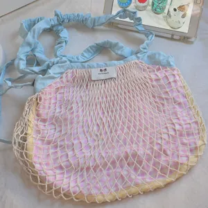Chic pastel plaid mesh shoulder bag with cute blue drawstring straps for casual daily wear stylish.