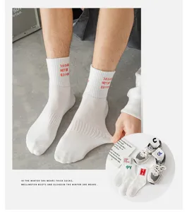 Men's white mid-calf cotton socks with letter print, casual streetwear athletic socks.