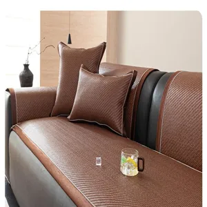 Cooling rattan sofa mat detail view, breathable brown woven cushion for summer home.