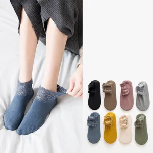Detailed view of women's thermal thick lace trim short socks featuring soft breathable fabric.