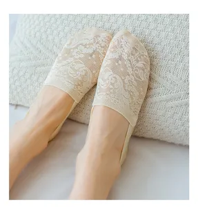 Closeup of women's lace boat socks in beige, featuring breathable mesh design for summer.
