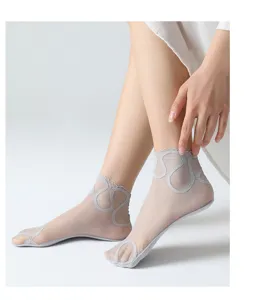 Close-up detail of women grey sheer lace mesh short ankle socks, breathable summer crystal socks.