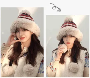Cozy winter plush furry warm hat with cute pom-pom and ethnic knit pattern for women.