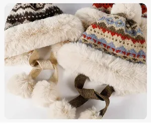 Plush winter knit hat detail, thick faux fur trim, cozy pom pom, warm earflap design.