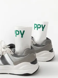 Men's stylish white mid-calf cotton socks with green letter knit design for casual daily wear.