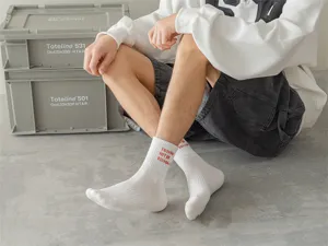 Men's mid-tube cotton socks white trend casual streetwear letter embroidered athletic socks.