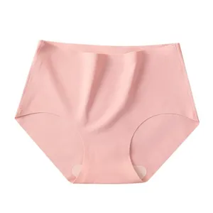 Women's ice silk seamless mid-waist brief panties in solid pink, flat lay main view.