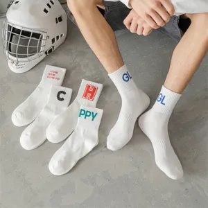 Men's mid-tube white cotton socks with trendy letter prints, streetwear casual sports style.