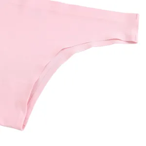 Detail view of women's seamless pink ice silk underwear showing smooth edge and fine stitching.